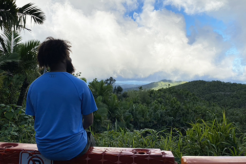 AJ faces landscape in Puerto Rico